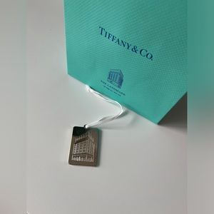 Tiffany & Co Fifth Ave — Landmark shopping bag and charm.